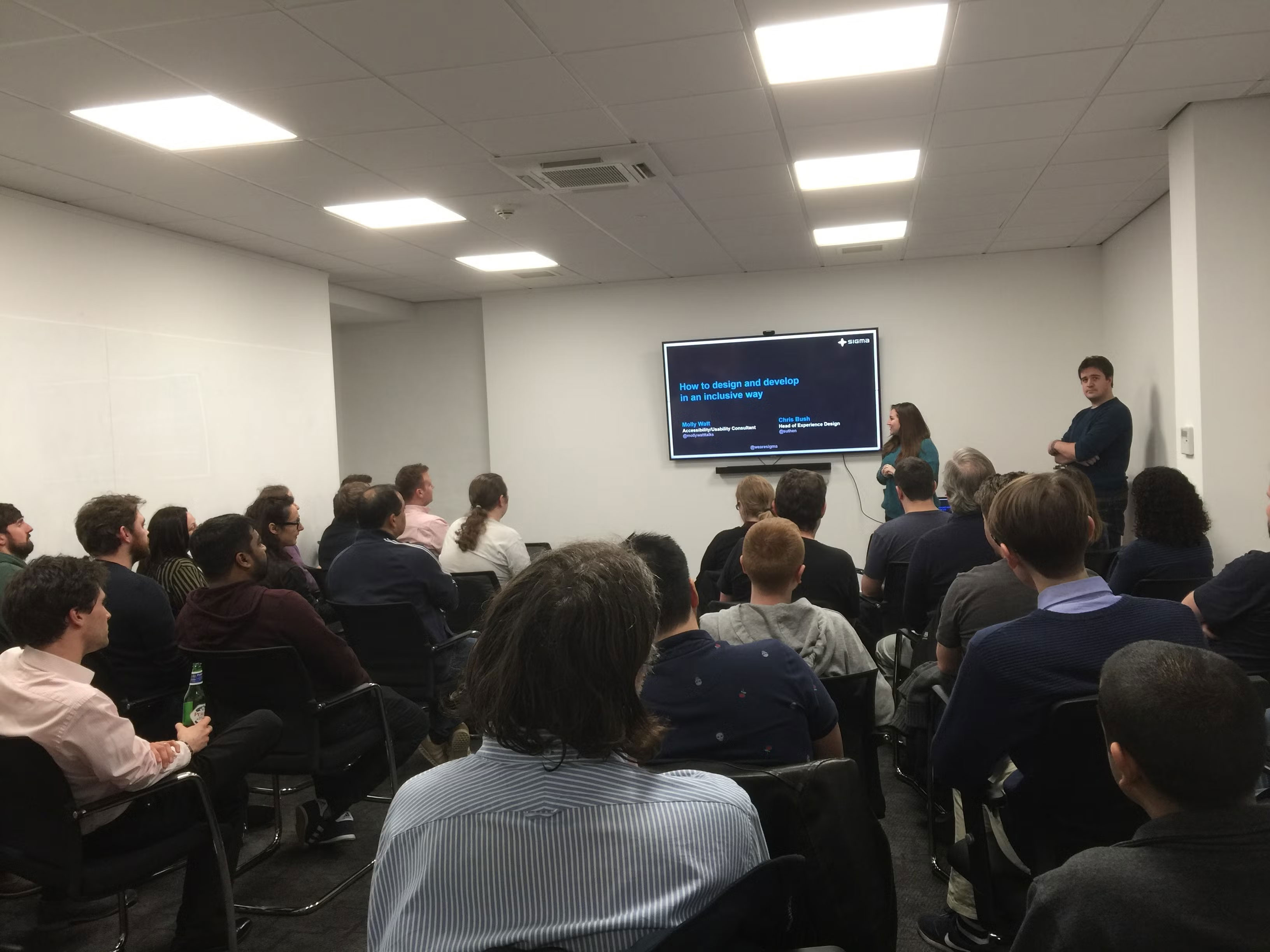 Molly and Chris presenting at Sigma, Macclesfield