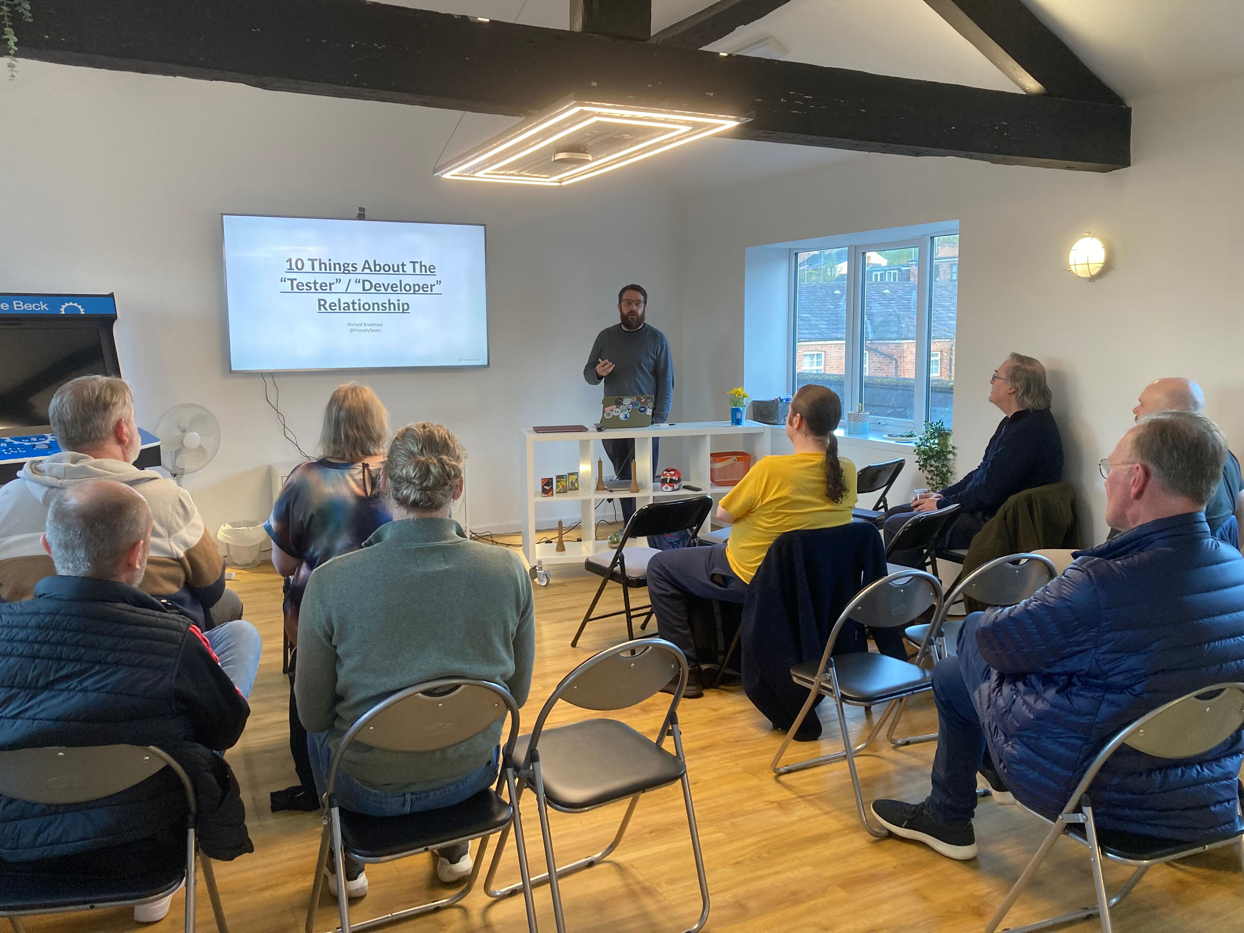 Richard Bradshaw presenting. Screen reads '10 Things About The Tester / Developer Relationship'