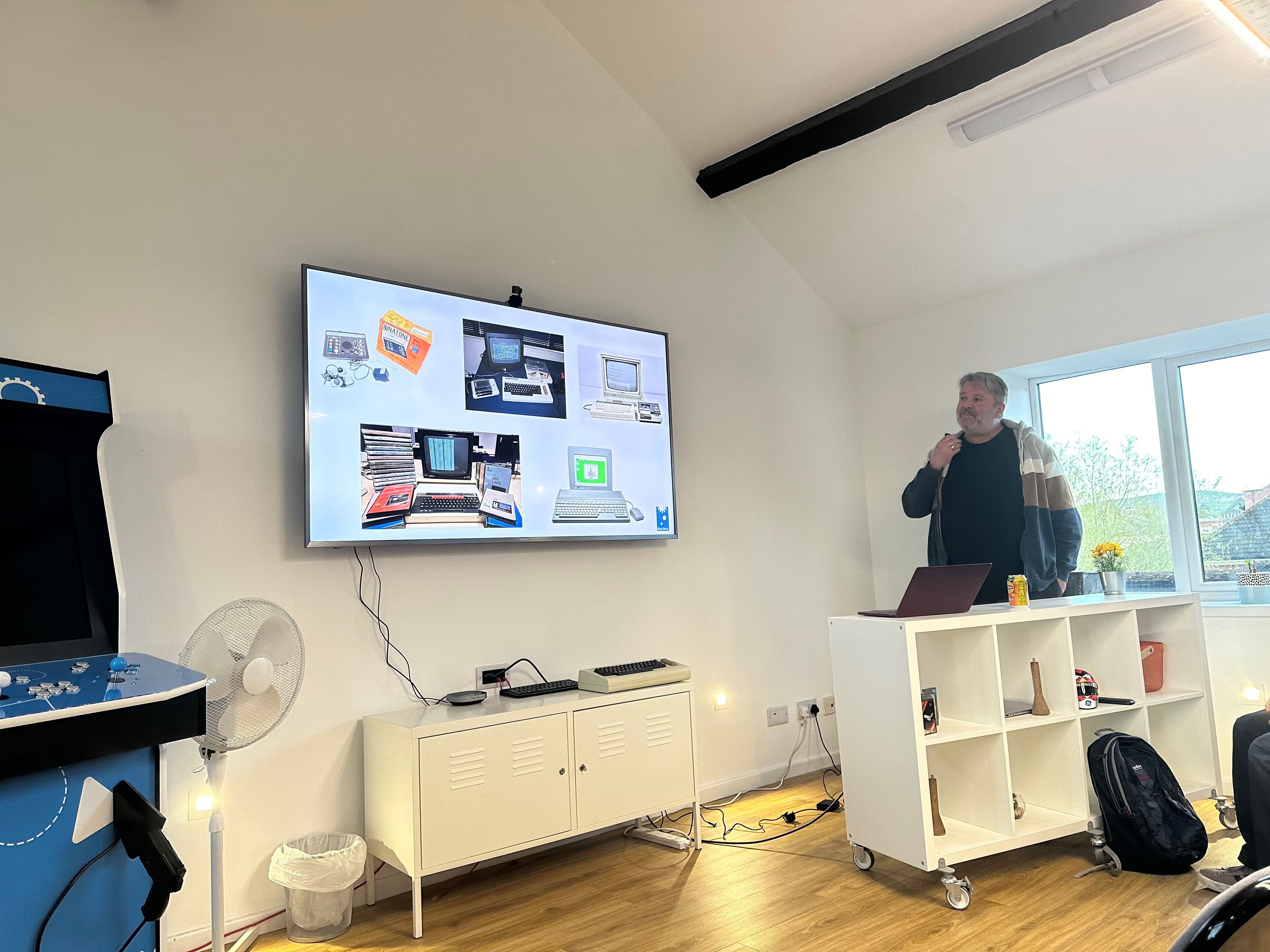 Pete Scott talking through 1980s computers