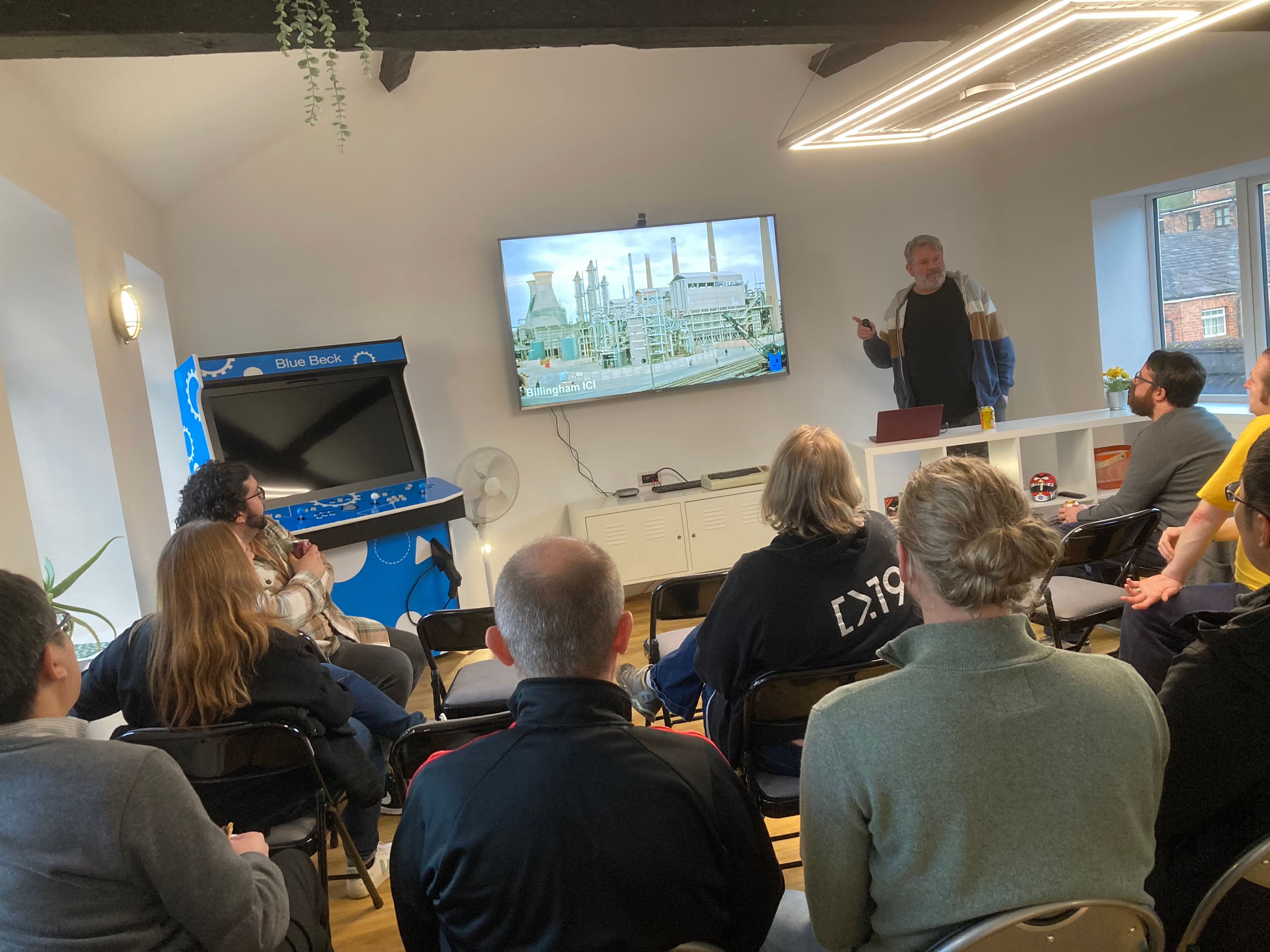 Pete Scott pointing to a picture of Billingham ICI.