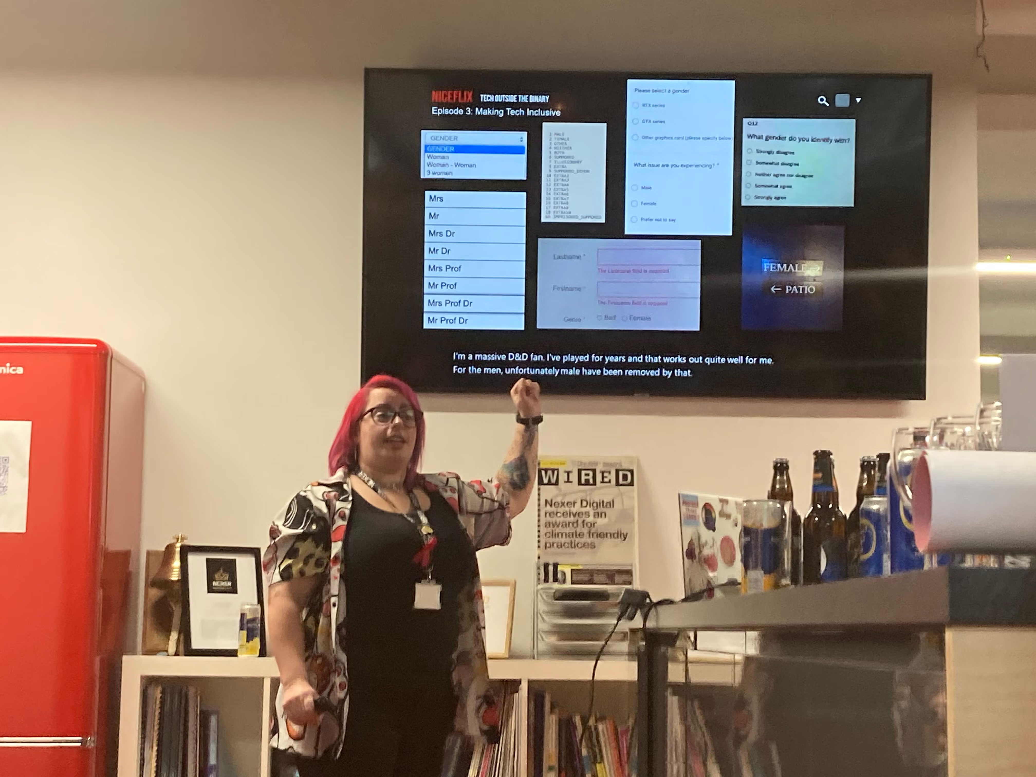 Tracey in front of their 'NiceFlix' presentation screen.