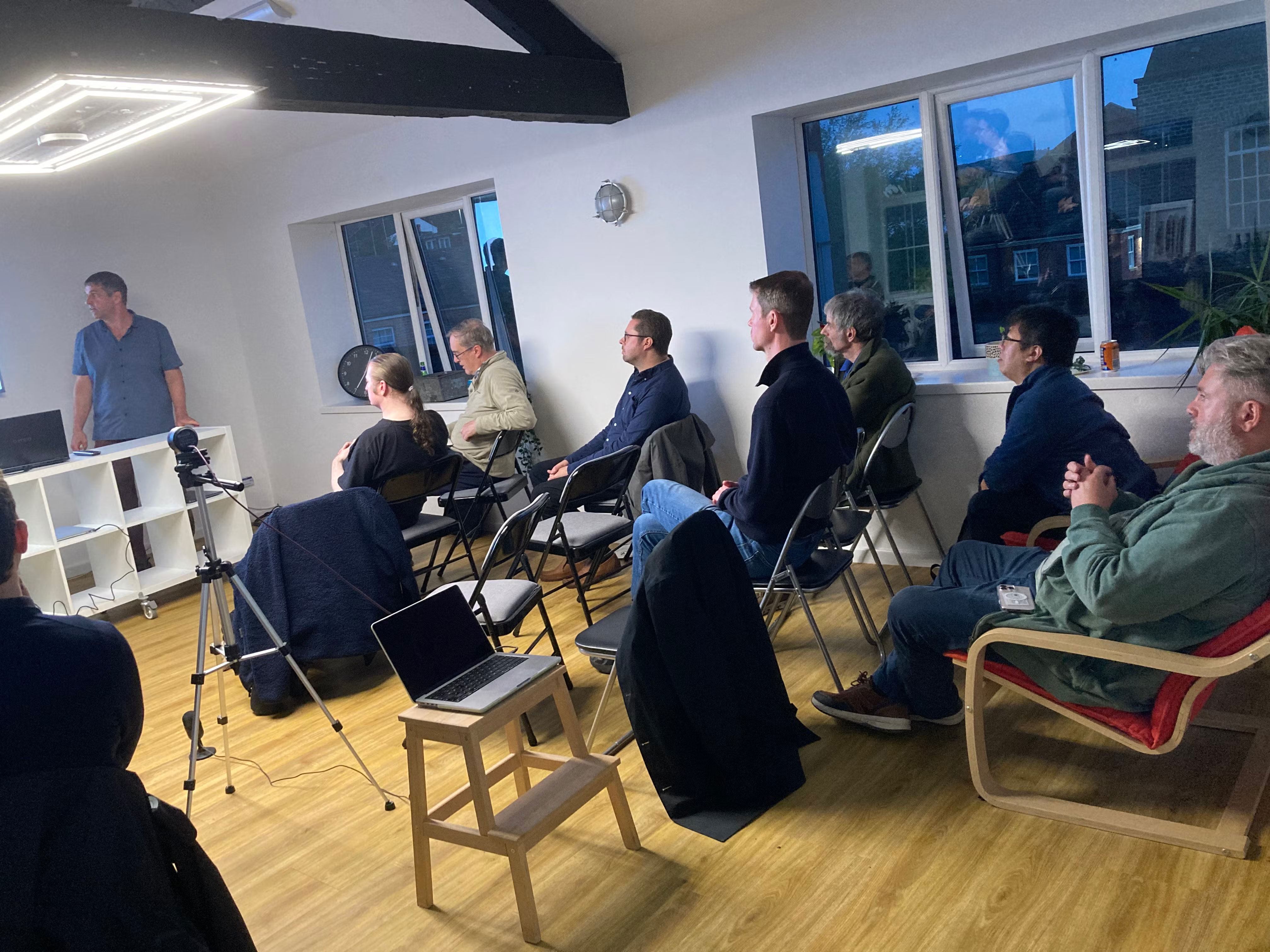 side view of audience, camera setup, Richard presenting