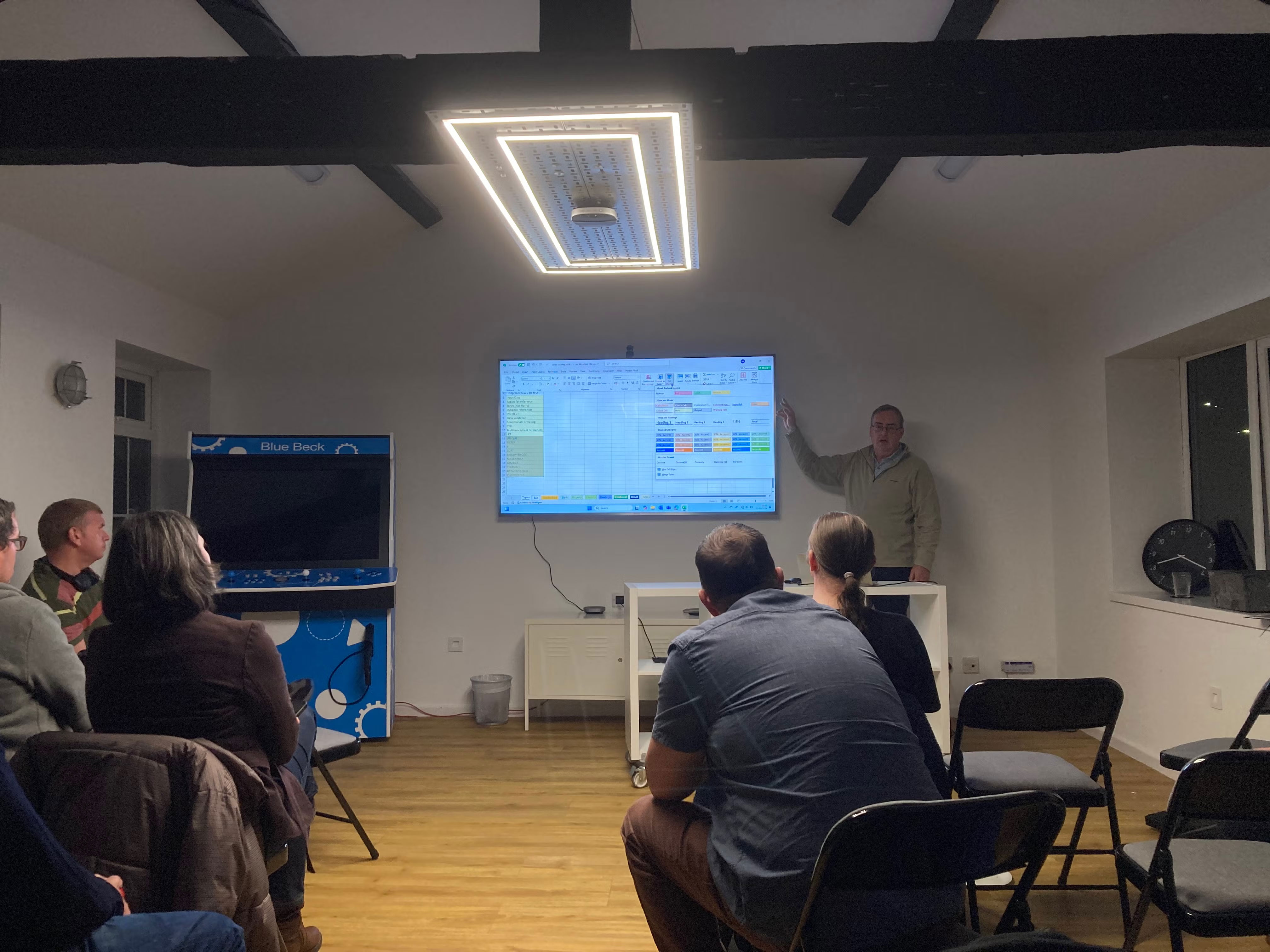 Nick presenting his Excel spreadsheet to the audience
