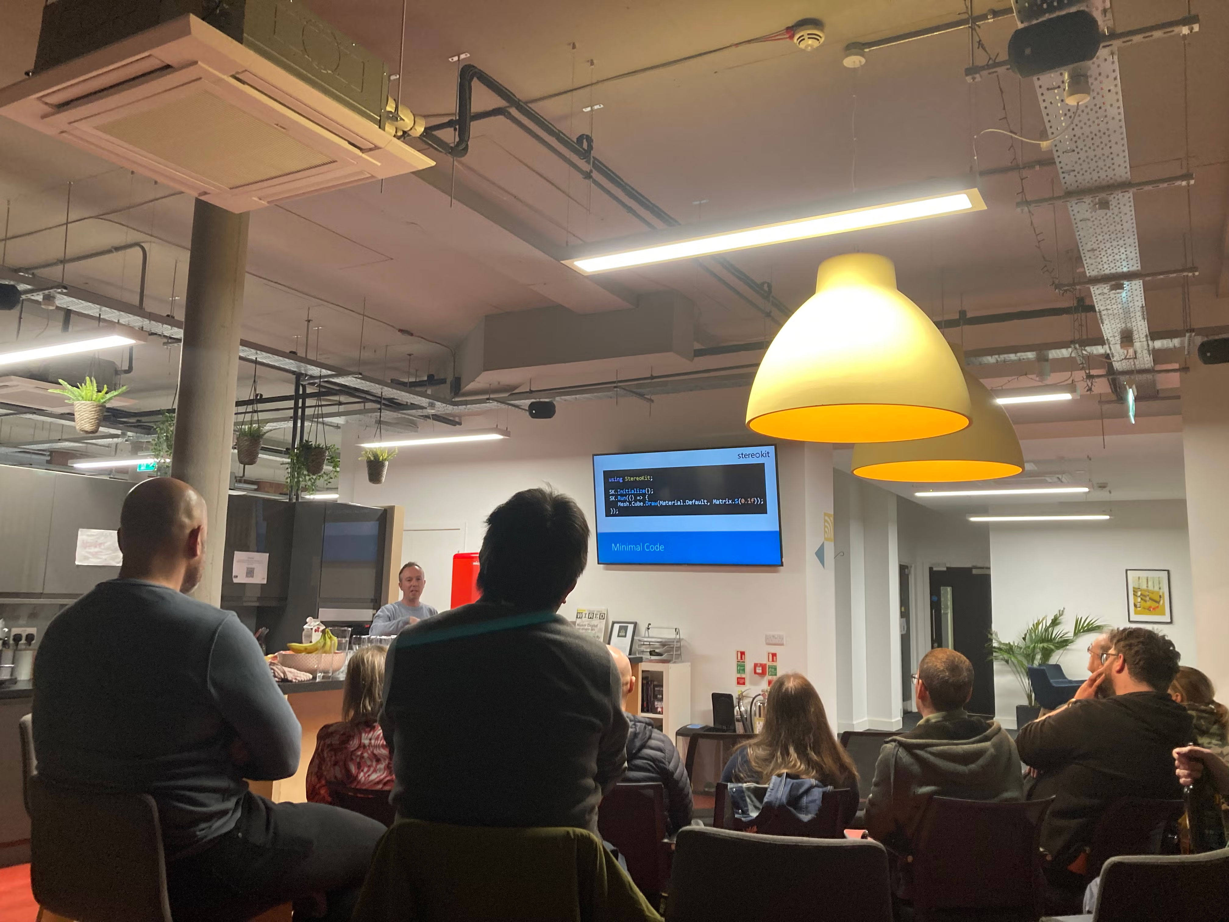 Lee Englestone presents a slide on Minimal Code.