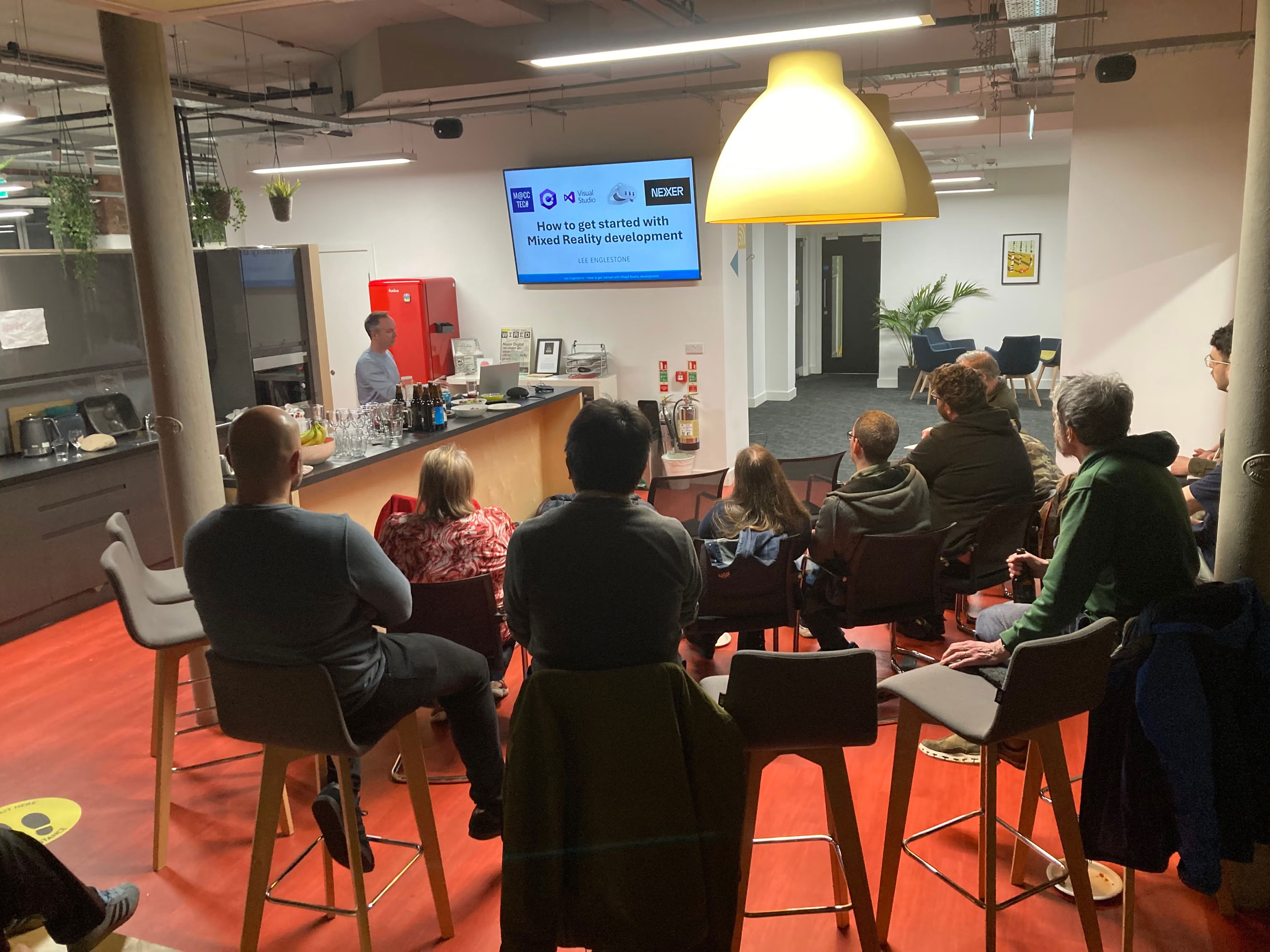 Lee Englestone starting his talk. Presentation screen reads 'How to get started with Mixed Reality development'