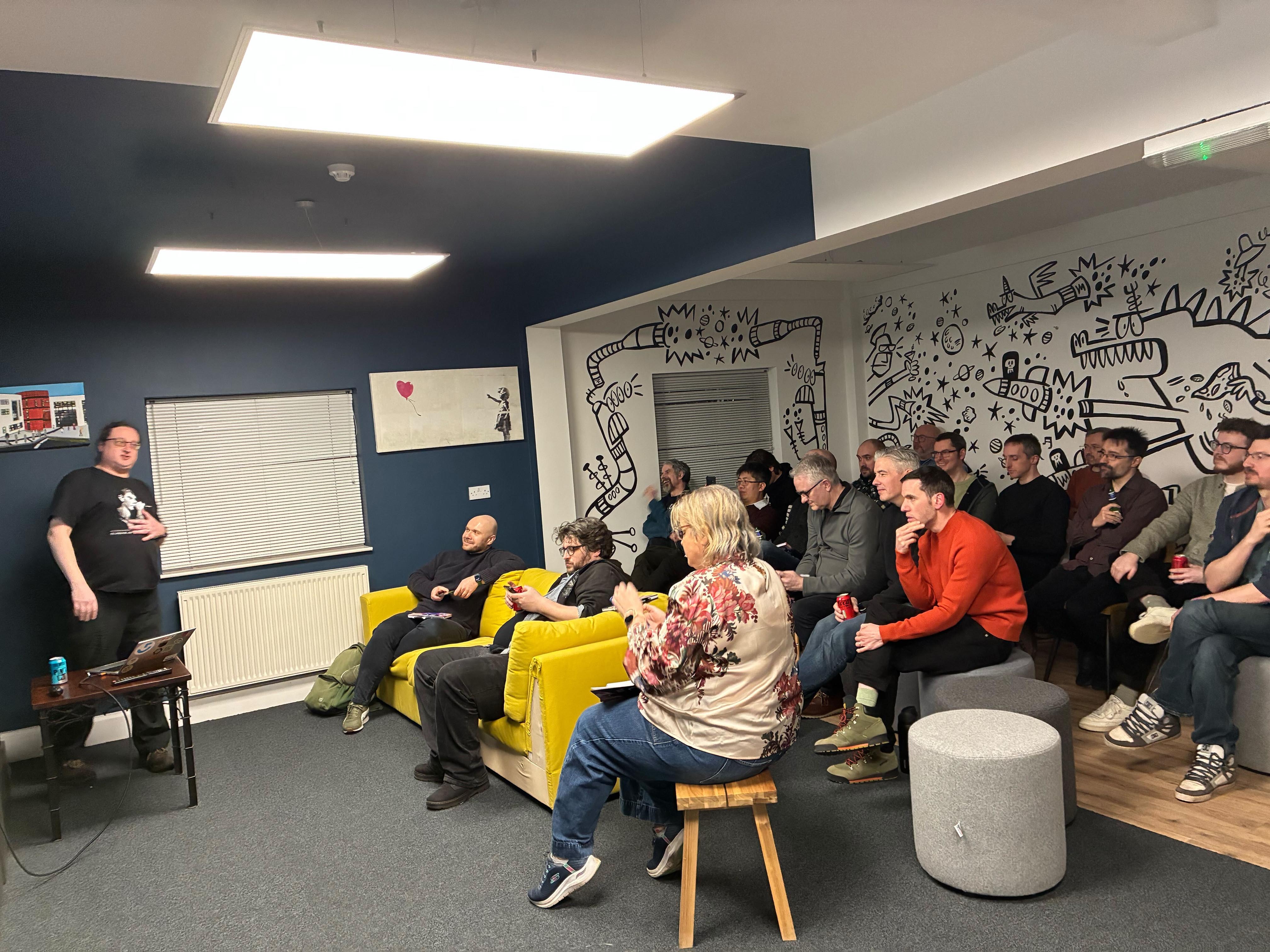 Tom prsenting, audience side view