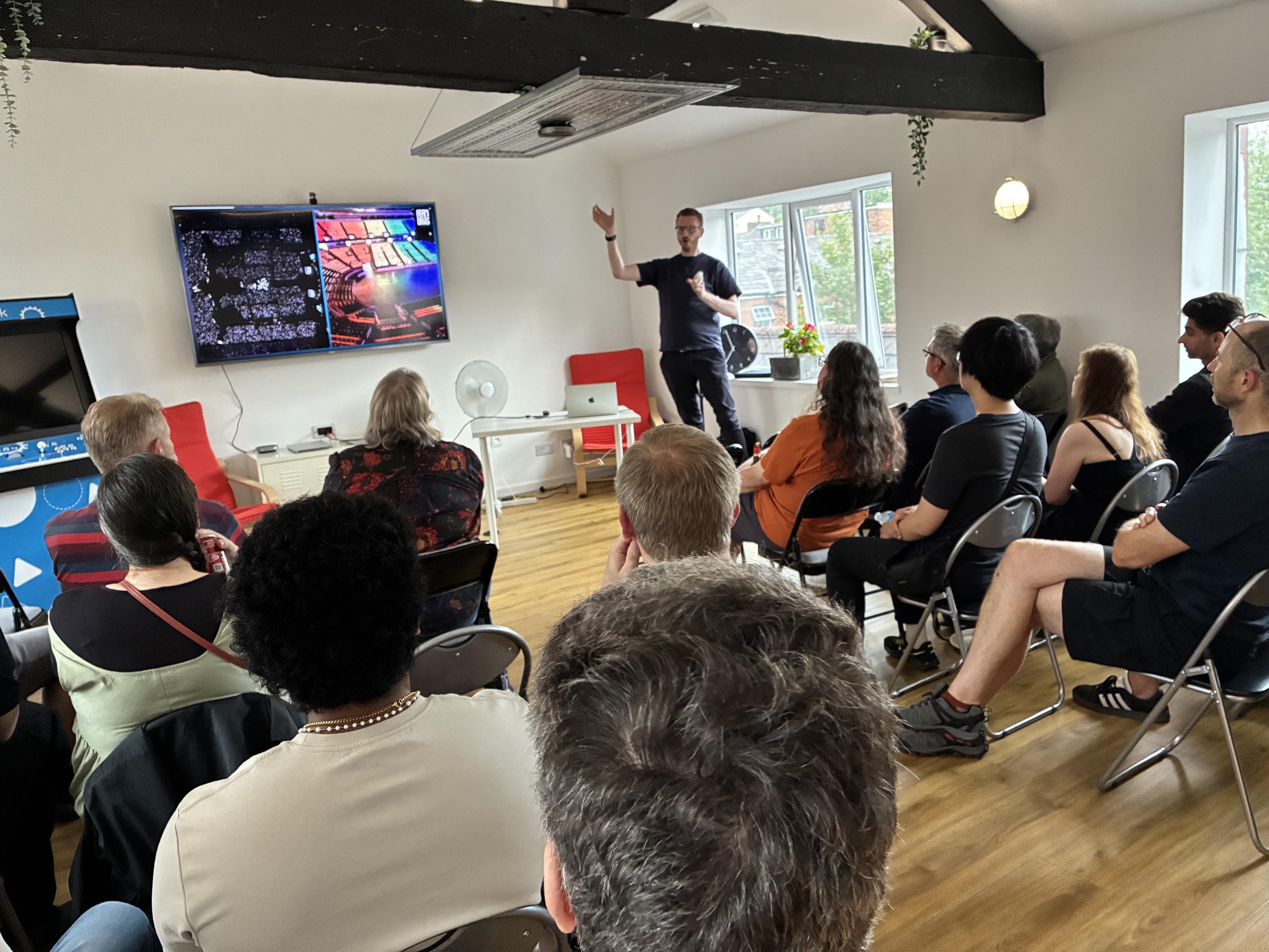 Adam talking to the full audience