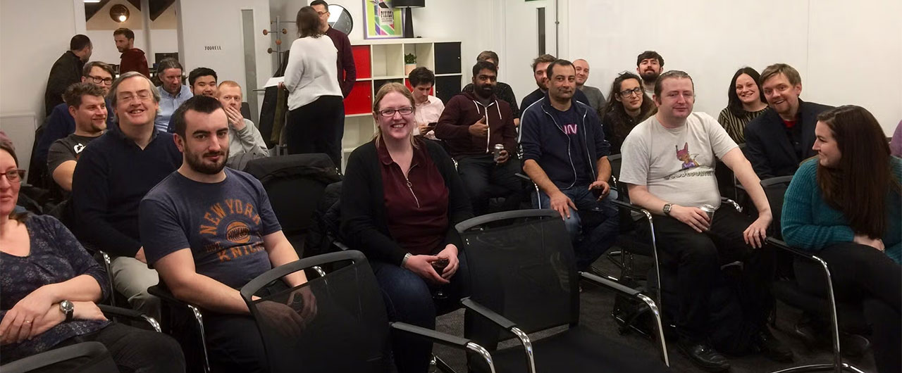 Macc Tech attendees, mainly seated, at the start of an event.